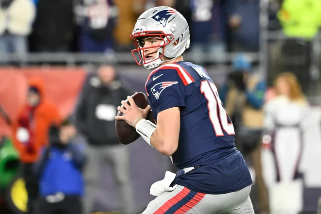 Jan 11, 2026; Foxborough, MA, USA; New England Patriots quarterback Drake Maye (10) looks to pass Los Angeles Chargers during the second half in an AFC Wild Card Round game at Gillette Stadium. Mandatory Credit: Eric Canha-Imagn Images