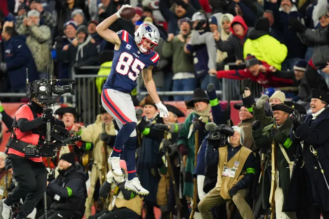 Jan 11, 2026; Foxborough, MA, USA; New England Patriots tight end Hunter Henry (85) celebrates after scoring a touchdown during the fourth quarter against the Los Angeles Chargers in an AFC Wild Card Round game at Gillette Stadium. Mandatory Credit: David Butler II-Imagn Images
