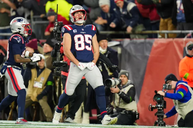 Jan 11, 2026; Foxborough, MA, USA; New England Patriots tight end Hunter Henry (85) celebrates after scoring a touchdown during the fourth quarter against the Los Angeles Chargers in an AFC Wild Card Round game at Gillette Stadium. Mandatory Credit: David Butler II-Imagn Images