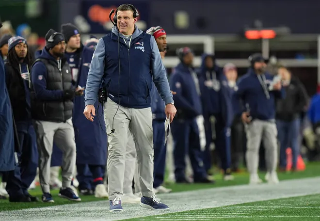 Jan 11, 2026; Foxborough, MA, USA; New England Patriots head coach Mike Vrabel watches from the sideline as they take on the Los Angeles Chargers in an AFC Wild Card Round game at Gillette Stadium. Mandatory Credit: David Butler II-Imagn Images