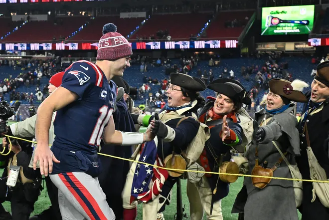 Jan 11, 2026; Foxborough, MA, USA; New England Patriots quarterback Drake Maye (10) celebrates defeating the Los Angeles Chargers in an AFC Wild Card Round game with the Massachusetts Minutemen at Gillette Stadium. Mandatory Credit: Eric Canha-Imagn Images