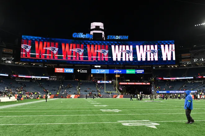 Jan 11, 2026; Foxborough, MA, USA; The scoreboard announces a New England Patriots win over the Los Angeles Chargers in an AFC Wild Card Round game at Gillette Stadium. Mandatory Credit: Eric Canha-Imagn Images