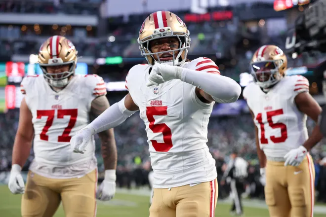 Jan 11, 2026; Philadelphia, PA, USA; San Francisco 49ers wide receiver Demarcus Robinson (5) celebrates a touchdown against the Philadelphia Eagles during the first quarter in an NFC Wild Card Round game at Lincoln Financial Field. Mandatory Credit: Bill Streicher-Imagn Images