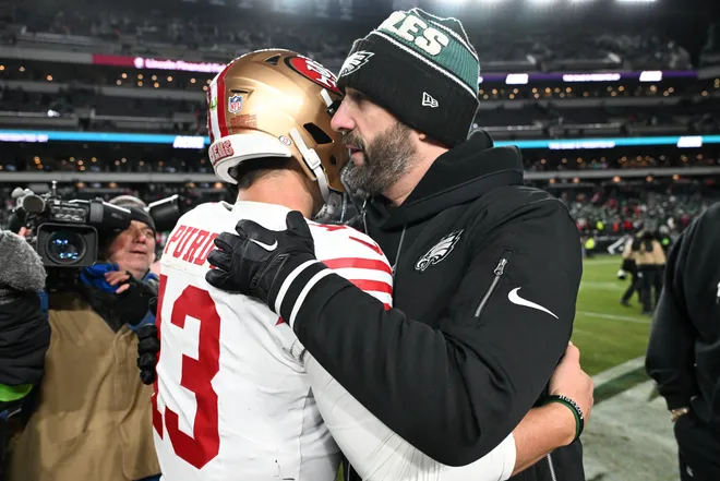 Jan 11, 2026; Philadelphia, PA, USA; Philadelphia Eagles head coach Nick Sirianni speaks to San Francisco 49ers quarterback Brock Purdy (13) after an NFC Wild Card Round game at Lincoln Financial Field. Mandatory Credit: Eric Hartline-Imagn Images