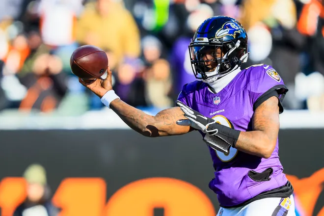 Dec 14, 2025; Cincinnati, Ohio, USA; Baltimore Ravens quarterback Lamar Jackson (8) throws a pass against the Cincinnati Bengals in the first half at Paycor Stadium. Mandatory Credit: Katie Stratman-Imagn Images