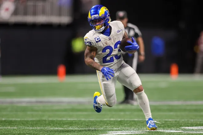 Dec 29, 2025; Atlanta, Georgia, USA; Los Angeles Rams running back Kyren Williams (23) runs the ball against the Atlanta Falcons in the fourth quarter at Mercedes-Benz Stadium.
