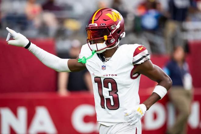 Sep 29, 2024; Glendale, Arizona, USA; Washington Commanders cornerback Emmanuel Forbes Jr. (13) against the Arizona Cardinals at State Farm Stadium. Mandatory Credit: Mark J. Rebilas-Imagn Images