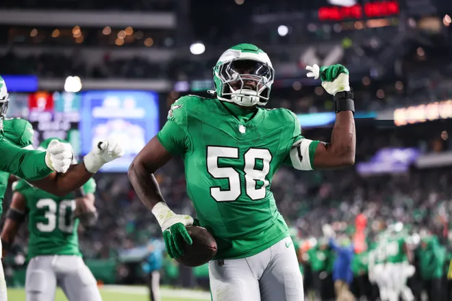 Jan 4, 2026; Philadelphia, Pennsylvania, USA; Philadelphia Eagles linebacker Jalyx Hunt (58) celebrates an interception during the second quarter against the Washington Commanders at Lincoln Financial Field. Mandatory Credit: Bill Streicher-Imagn Images
