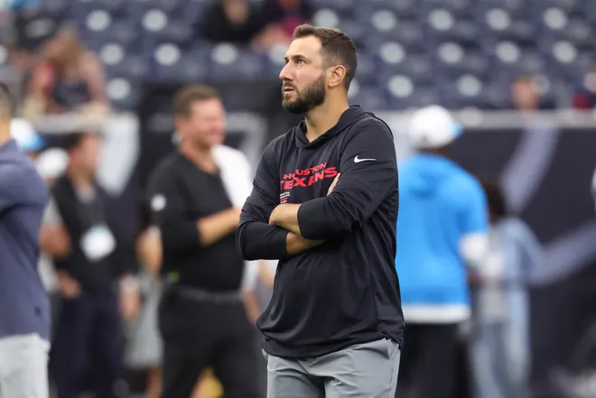 Aug 16, 2025; Houston, Texas, USA; Houston Texans offensive coordinator Nick Caley stands on the field before the game against the Carolina Panthers at NRG Stadium. Mandatory Credit: Troy Taormina-Imagn Images