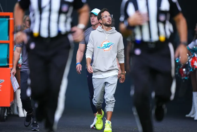 MIAMI GARDENS, FLORIDA - AUGUST 23: Head coach Mike McDaniel of the Miami Dolphins enters the field prior to a NFL Preseason 2025 game between Jacksonville Jaguars and Miami Dolphins at Hard Rock Stadium on August 23, 2025 in Miami Gardens, Florida. (Photo by Rich Storry/Getty Images)