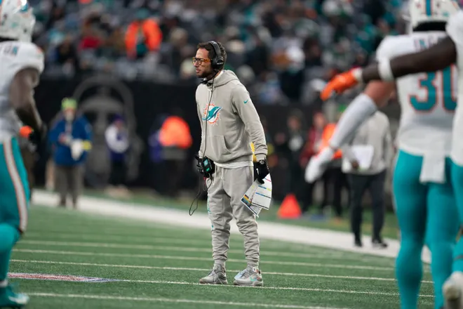 Miami Dolphin's head coach Mike McDaniel stands on the field during a week 14 football game between the New York Jets and Miami Dolphins at MetLife Stadium on Sunday, Dec. 7, 2025.