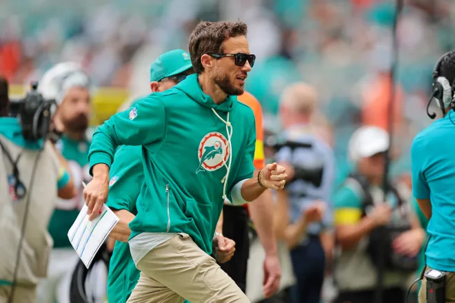 Dec 21, 2025; Miami Gardens, Florida, USA; Miami Dolphins head coach Mike McDaniel looks on during the second quarter against the Cincinnati Bengals at Hard Rock Stadium. Mandatory Credit: Sam Navarro-Imagn Images