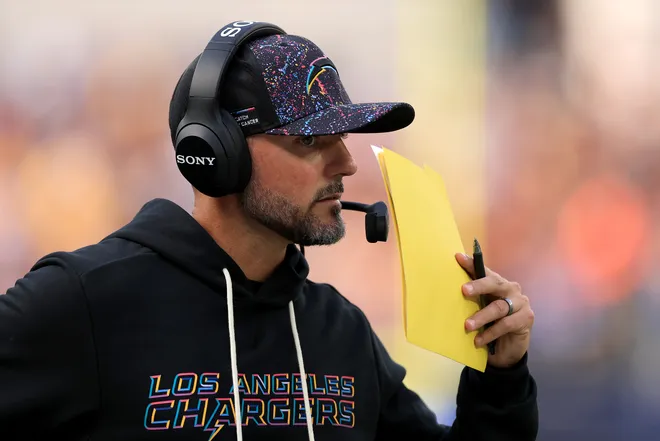 INGLEWOOD, CALIFORNIA - OCTOBER 05: Defensive coordinator Jesse Minter of the Los Angeles Chargers looks on against the Washington Commanders at SoFi Stadium on October 05, 2025 in Inglewood, California. (Photo by Luke Hales/Getty Images)