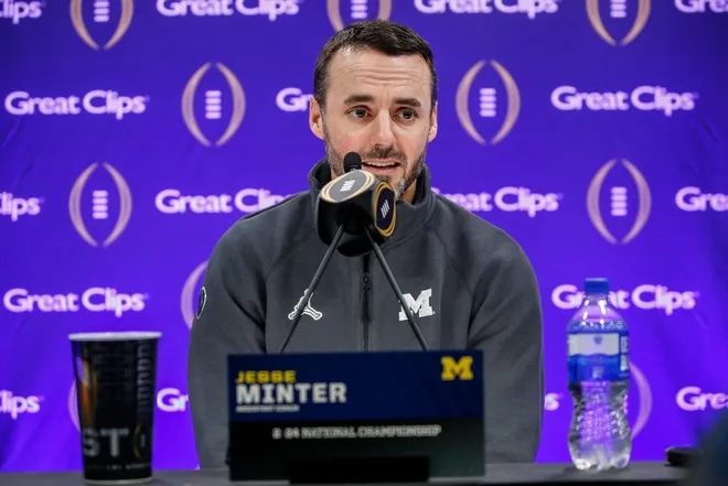 Michigan defensive coordinator Jesse Minter speaks during Media Day at George R. Brown Convention Center in Houston, Texas on Saturday, Jan. 6, 2024.