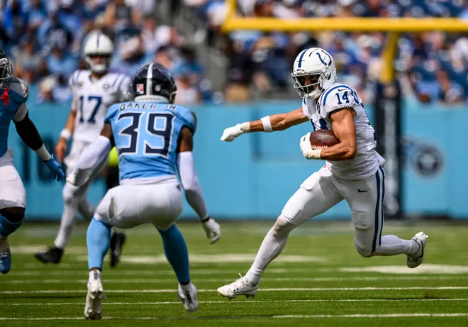 Sep 21, 2025; Nashville, Tennessee, USA; Indianapolis Colts wide receiver Alec Pierce (14) runs after making a catch during the third quarter at Nissan Stadium. Mandatory Credit: Steve Roberts-Imagn Images