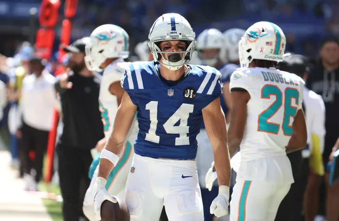 Sep 7, 2025; Indianapolis, Indiana, USA; Indianapolis Colts wide receiver Alec Pierce (14) celebrates after making a catch during the second half against the Miami Dolphins at Lucas Oil Stadium. Mandatory Credit: Trevor Ruszkowski-Imagn Images