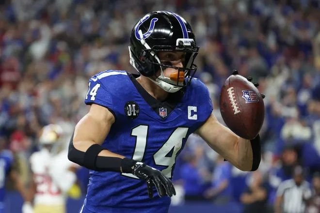 Dec 22, 2025; Indianapolis, Indiana, USA; Indianapolis Colts wide receiver Alec Pierce (14) celebrates after scoring a touchdown against the San Francisco 49ers in the second quarter of the game at Lucas Oil Stadium. Mandatory Credit: Trevor Ruszkowski-Imagn Images