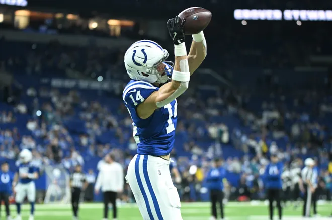 Dec 28, 2025; Indianapolis, Indiana, USA; Indianapolis Colts wide receiver Alec Pierce (14) warms up before a game against the Jacksonville Jaguars at Lucas Oil Stadium. Mandatory Credit: Robert Goddin-Imagn Images