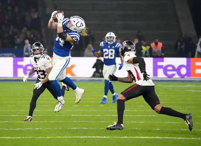 Nov 9, 2025; Berlin, Germany; Indianapolis Colts tight end Tyler Warren (84) catches a pass against the Atlanta Falcons during the NFL Berlin Game at Olympic Stadium. Mandatory Credit: Kirby Lee-Imagn Images