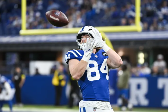 Oct 26, 2025; Indianapolis, Indiana, USA; Indianapolis Colts tight end Tyler Warren (84) warms up before the game against the Tennessee Titans at Lucas Oil Stadium. Mandatory Credit: Robert Goddin-Imagn Images