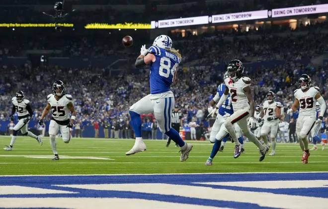 Indianapolis Colts tight end Tyler Warren (84) makes a catch for a touchdown Sunday, Nov. 30, 2025, during a game against the Houston Texans at Lucas Oil Stadium in Indianapolis.