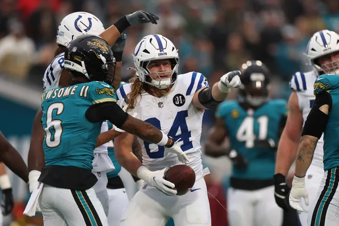 Dec 7, 2025; Jacksonville, Florida, USA; Indianapolis Colts tight end Tyler Warren (84) reacts after a reception against the Jacksonville Jaguars during the first half at EverBank Stadium. Mandatory Credit: Matt Pendleton-Imagn Images