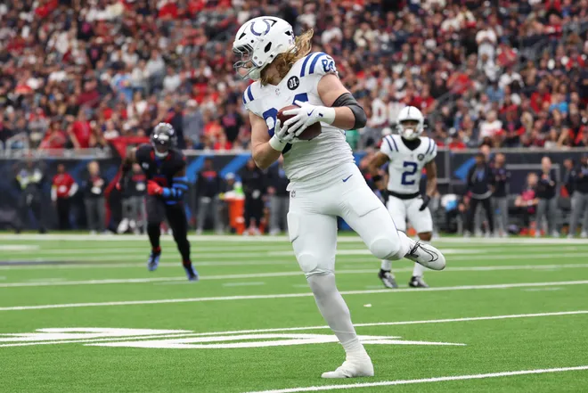 Jan 4, 2026; Houston, Texas, USA; Indianapolis Colts tight end Tyler Warren (84) runs after the catch against the Houston Texans during the first half at NRG Stadium. Mandatory Credit: Thomas Shea-Imagn Images