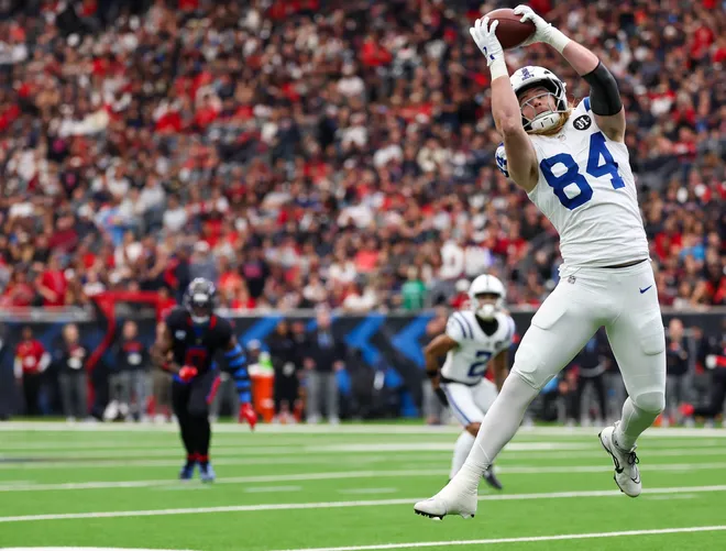 Jan 4, 2026; Houston, Texas, USA; Indianapolis Colts tight end Tyler Warren (84) makes a reception against the Houston Texans in the first half at NRG Stadium. Mandatory Credit: Thomas Shea-Imagn Images