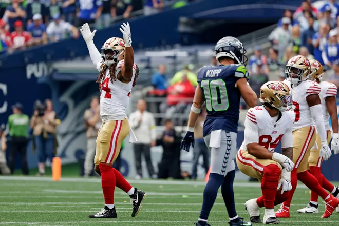 San Francisco 49ers linebacker Fred Warner reacts after a play during the first half against the Seattle Seahawks at Lumen Field.