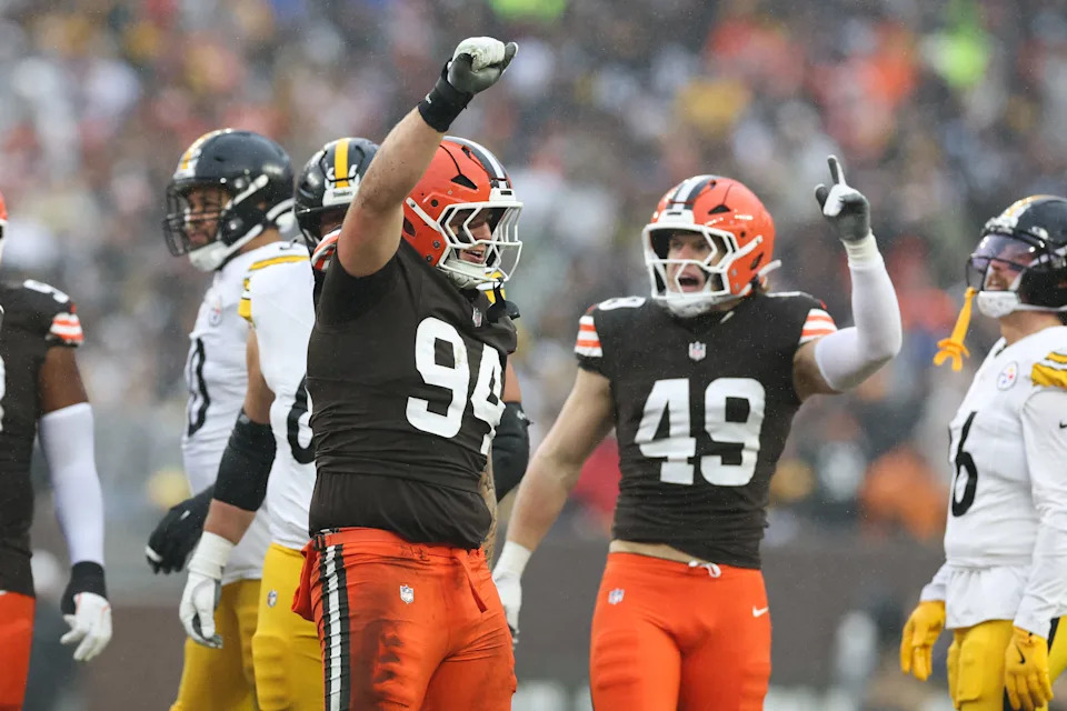 Dec 28, 2025; Cleveland, Ohio, USA; Cleveland Browns defensive tackle Mason Graham (94) and linebacker Carson Schwesinger (49) celebrate in the second quarter against the Pittsburgh Steelers at Huntington Bank Field. Mandatory Credit: Scott Galvin-Imagn Images