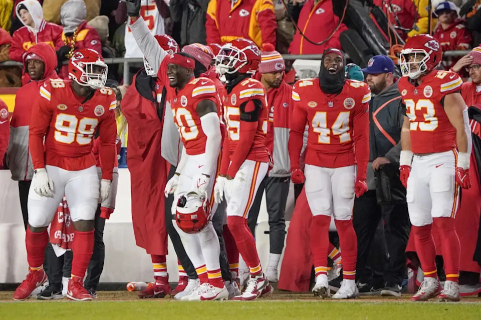 Dec 31, 2023; Kansas City, Missouri, USA; Several Kansas City Chiefs players dance on the sidelines against the Cincinnati Bengals during the game at GEHA Field at Arrowhead Stadium. Mandatory Credit: Denny Medley-USA TODAY Sports