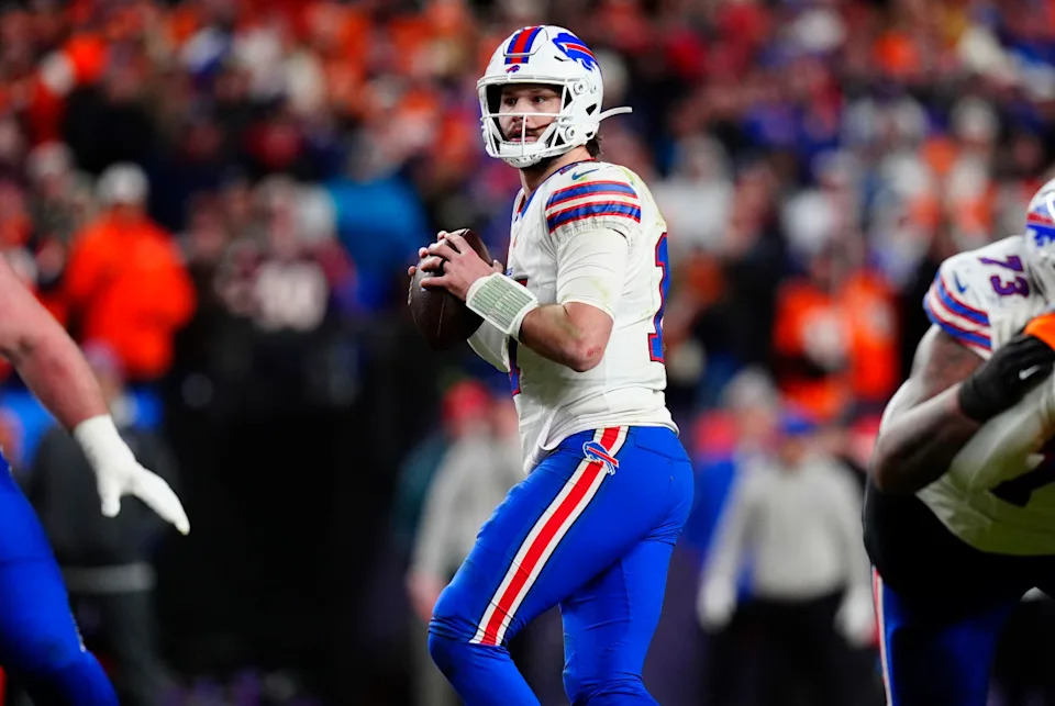 Jan 17, 2026; Denver, CO, USA; Buffalo Bills quarterback Josh Allen (17) drops to throw during the fourth quarter of an AFC Divisional Round playoff game against the Denver Broncos at Empower Field at Mile High. Mandatory Credit: Ron Chenoy-Imagn Images© Ron Chenoy-Imagn Images