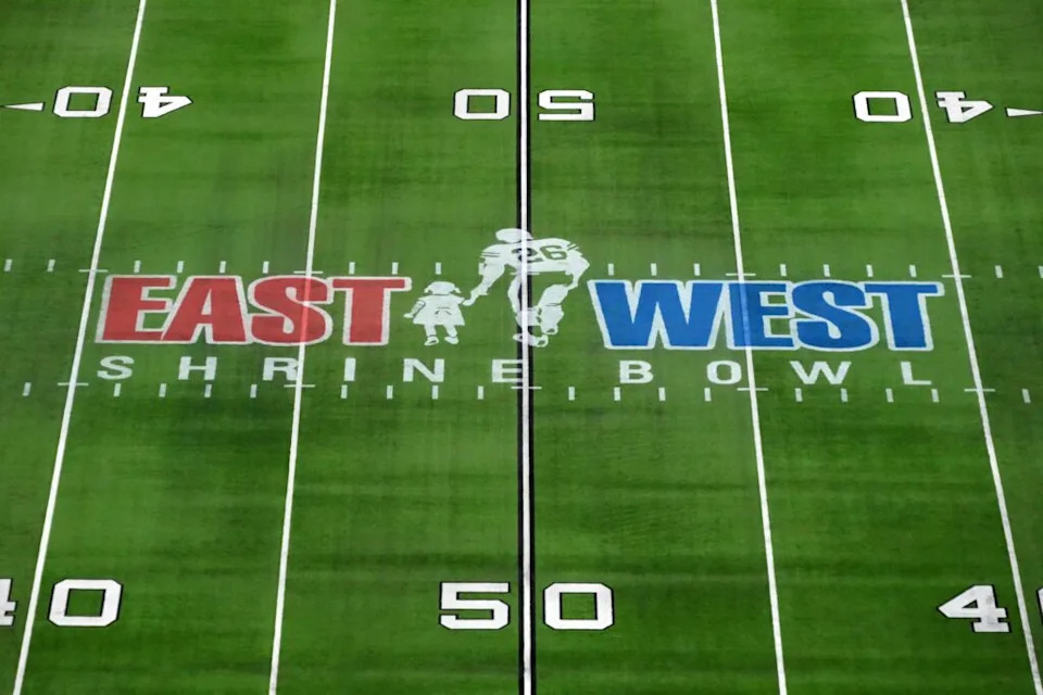 Feb 3, 2022; Las Vegas, NV, USA; A detailed view of the East-West Shrine Bowl logo at midfield at Allegiant Stadium. Mandatory Credit: Kirby Lee-Imagn Images