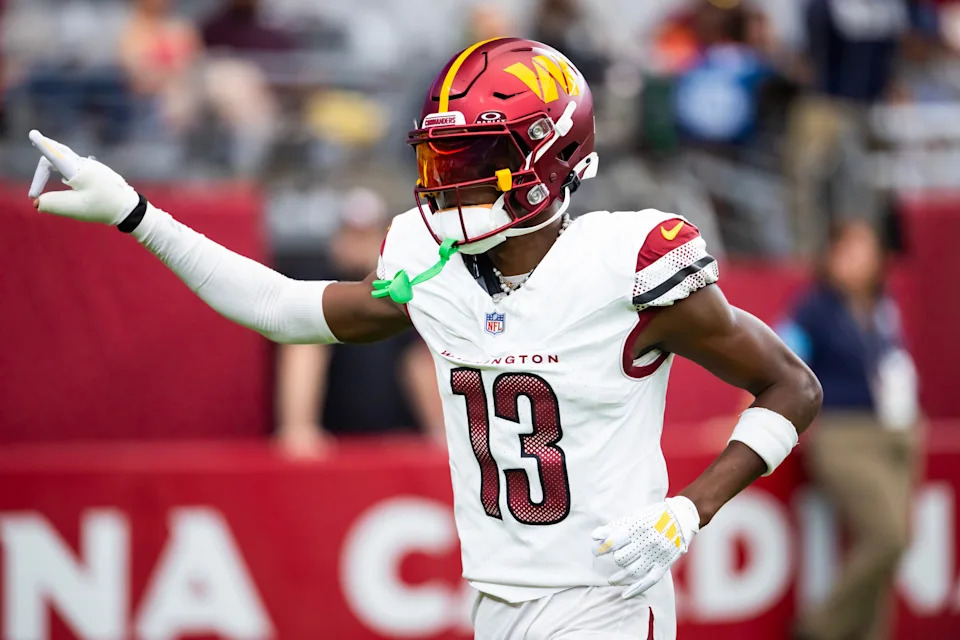 Sep 29, 2024; Glendale, Arizona, USA; Washington Commanders cornerback Emmanuel Forbes Jr. (13) against the Arizona Cardinals at State Farm Stadium. Mandatory Credit: Mark J. Rebilas-Imagn Images
