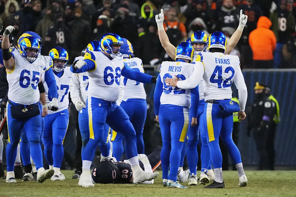 Jan 18, 2026; Chicago, IL, USA; Los Angeles Rams placekicker Harrison Mevis (92) celebrates with teammates after kicking the game-winning forty-two yard field goal against the Chicago Bears during overtime of an NFC Divisional Round game at Soldier Field. Mandatory Credit: David Banks-Imagn Images