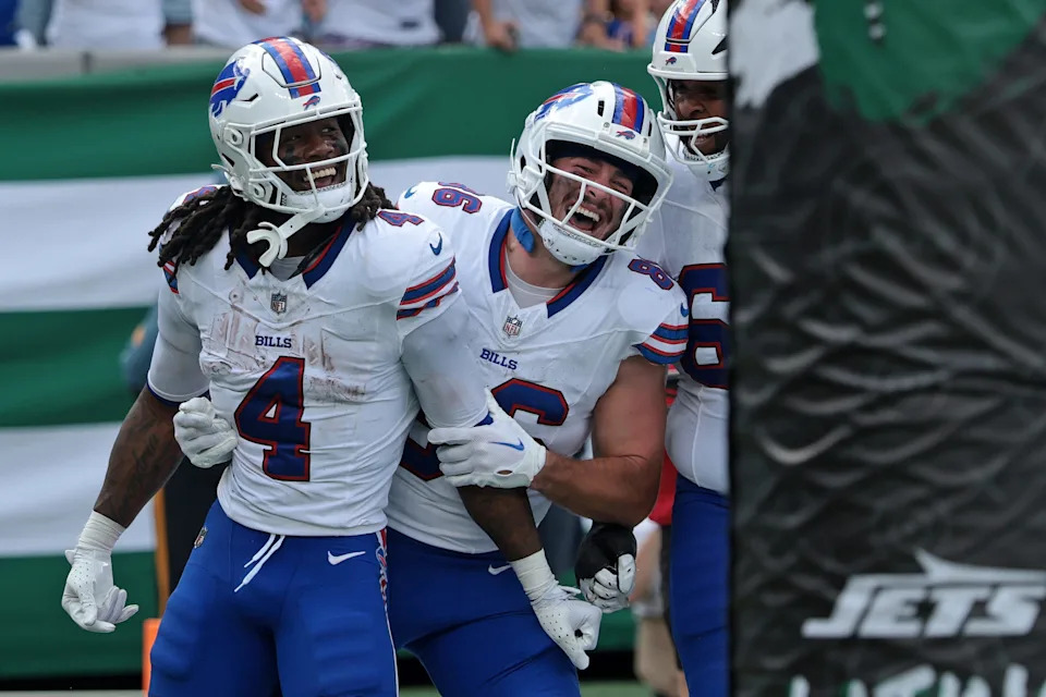 Sep 14, 2025; East Rutherford, New Jersey, USA; Buffalo Bills running back James Cook (4) reacts after rushing the ball for a touchdown against the New York Jets during the first half at MetLife Stadium. Mandatory Credit: Vincent Carchietta-Imagn Images