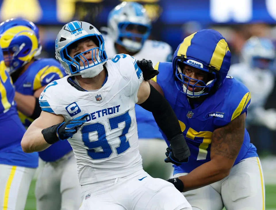Rams offensive tackle Alaric Jackson, right, blocks Detroit Lions edge rusher Aidan Hutchinson during a Rams win on Dec. 14.