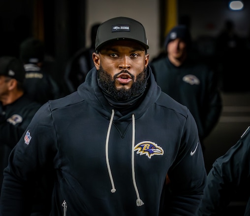 Sunday, Jan. 4, 2026 — Baltimore Ravens defensive coordinator Zach Orr takes the field during warm-ups as the Ravens prepare to play the Steelers at Acrisure Stadium in Pittsburgh.