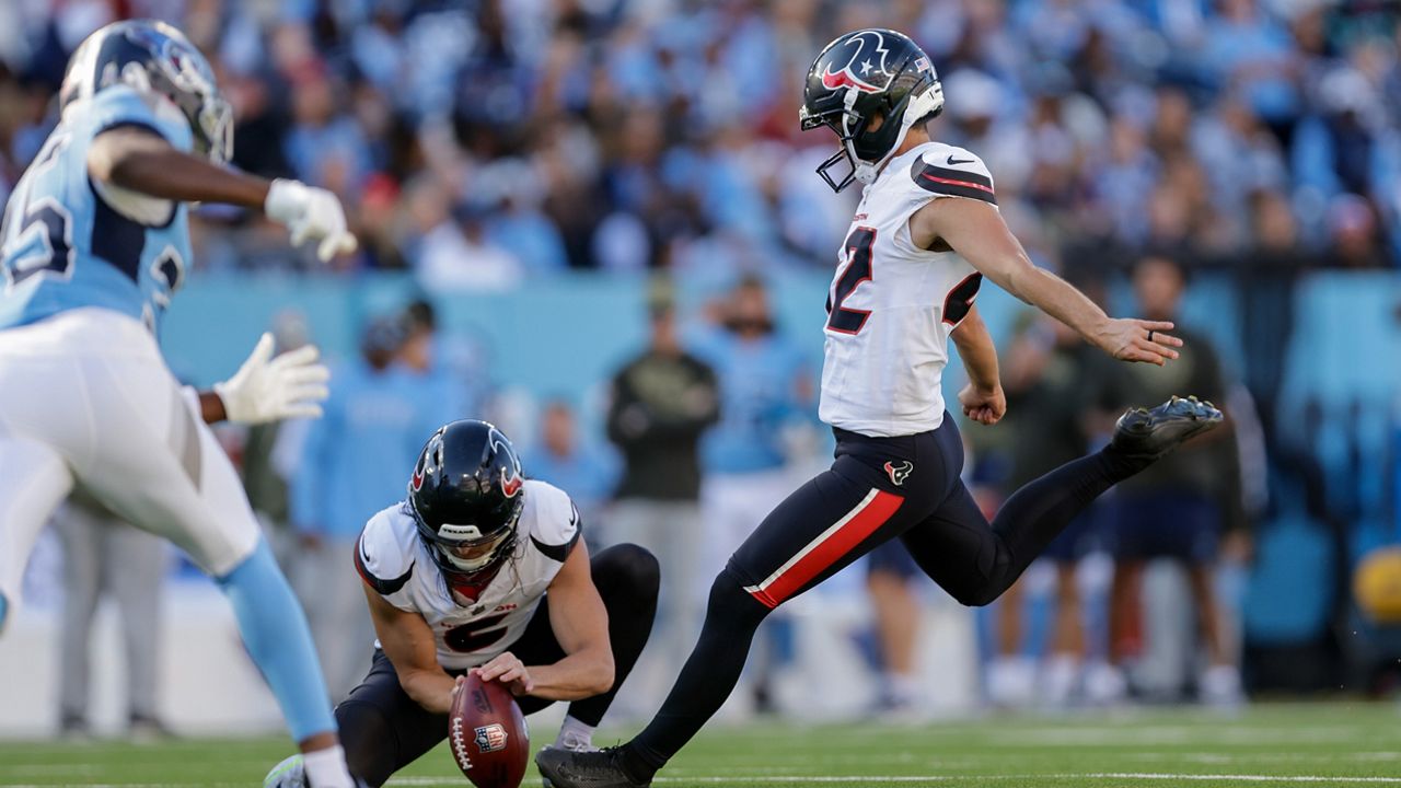 Kicker Matthew Wright (42) kicks a field goal from the hold of punter Tommy Townsend (6) during the second half of an NFL football game against the Tennessee Titans, Nov. 16, 2025, in Nashville, Tenn. (AP Photo/Stew Milne, File)