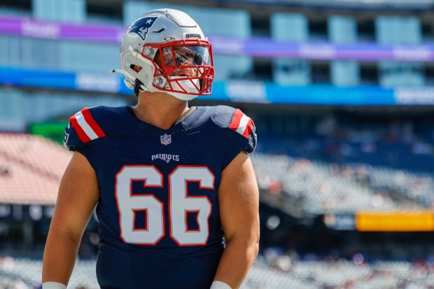 Patriots offensive tackle Will Campbell warms up prior to the start of an NFL game against the Carolina Panthers on Sunday, Sept. 28 in Foxboro. (AP Photo/Greg M. Cooper)