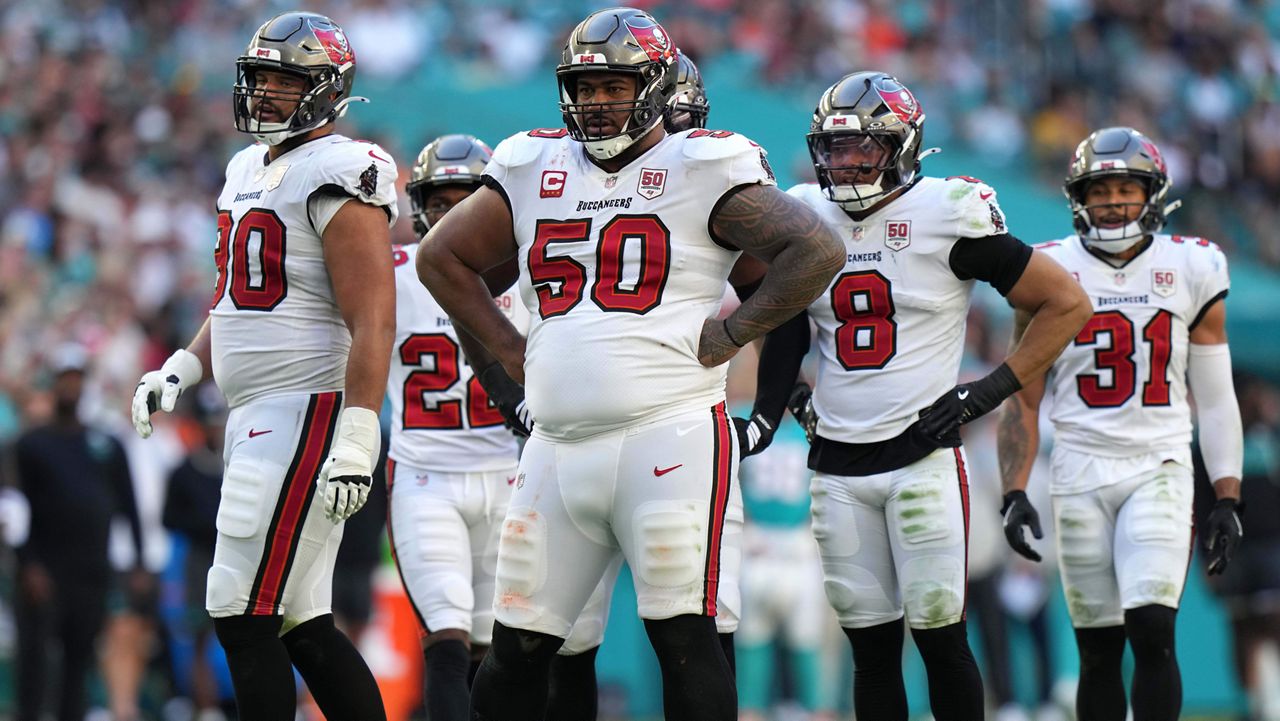 Tampa Bay Buccaneers defensive tackle Vita Vea (50) looks on during the second half of an NFL football game against the Miami Dolphins Sunday, Dec. 28, 2025, in Miami Gardens, Fla. (AP Photo/Lynne Sladky)