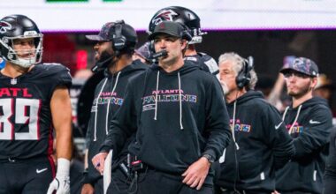 Atlanta Falcons offensive coordinator Zac Robinson works during the first half of an NFL football game against the Washington Commanders, Sunday, Sep. 28, 2025, in Atlanta. (AP Photo/Danny Karnik, File)
