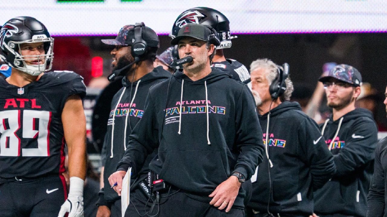 Atlanta Falcons offensive coordinator Zac Robinson works during the first half of an NFL football game against the Washington Commanders, Sunday, Sep. 28, 2025, in Atlanta. (AP Photo/Danny Karnik, File)