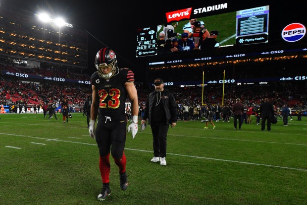 San Francisco 49ers' Christian McCaffrey (23) walks off the field after their NFL game at Levi's Stadium in Santa Clara, Calif., on Saturday, Jan. 3, 2026. The Seattle Seahawks defeated the San Francisco 49ers 13-3. (Jose Carlos Fajardo/Bay Area News Group)