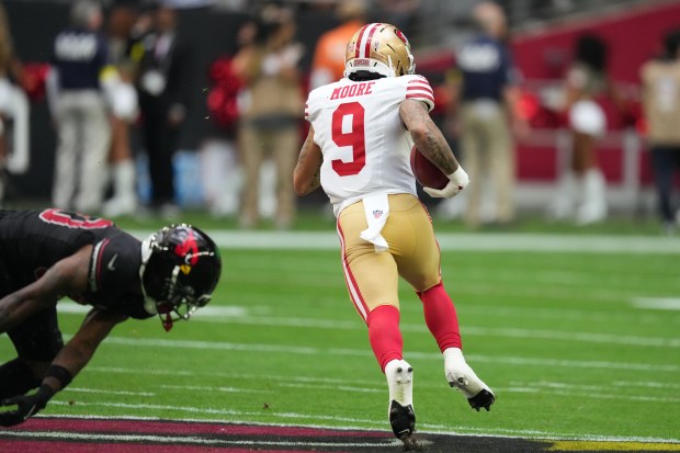 San Francisco 49ers' Skyy Moore (9) returns a kickoff during the first half of an NFL football game against the Arizona Cardinals in Glendale, Ariz., Sunday, Nov. 16, 2025. (AP Photo/Ross D. Franklin)