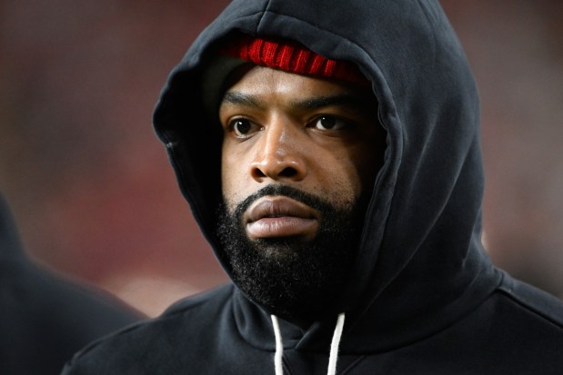 San Francisco 49ers offensive tackle Trent Williams walks on the sideline during the second half of an NFL football game against the Chicago Bears in Santa Clara, Calif., Sunday, Dec. 28, 2025. (AP Photo/Eakin Howard)