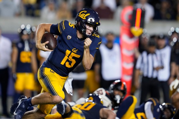 California quarterback Fernando Mendoza runs with the ball during the second half of the team's NCAA college football game against Oregon State on Saturday, Oct. 7, 2023, in Berkeley, Calif. (AP Photo/Godofredo A. Vásquez)