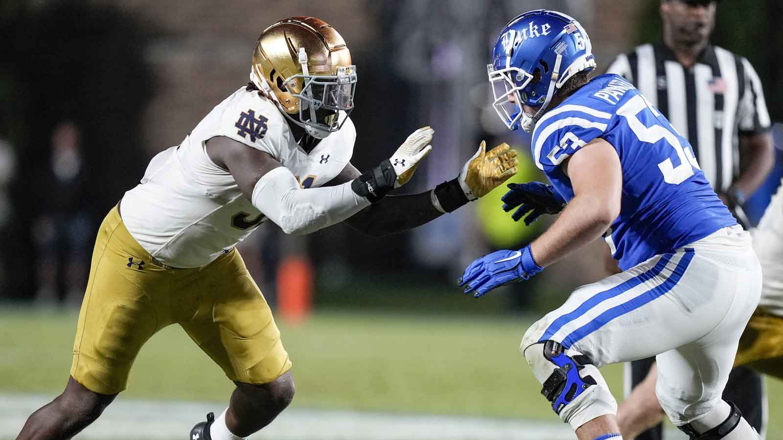 Notre Dame Fighting Irish defensive lineman Nana Osafo-Mensah (31) against Duke Blue Devils offensive lineman Brian Parker II (53) during the second half at Wallace Wade Stadium. 