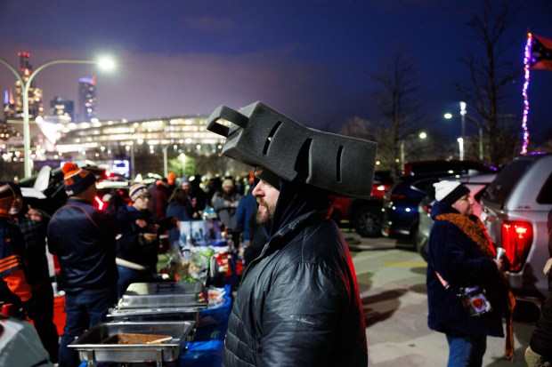 Rob Moore wears a cheese grater hat while tailgating before the Chicago Bears play the Green Bay Packers in a NFC wild-card game at Soldier Field Jan. 10, 2026, in Chicago. (Armando L. Sanchez/Chicago Tribune)