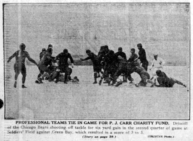 On an icy Soldier Field, the Chicago Bears tied the Green Bay Packers 3-3 during a Christmas fund charity game on Dec. 19, 1926. The Bears were scoreless with five minutes to play when Paddy Driscoll drop kicked the tying field goal. (Chicago Tribune)